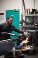 Repoussage manuel à la flamme